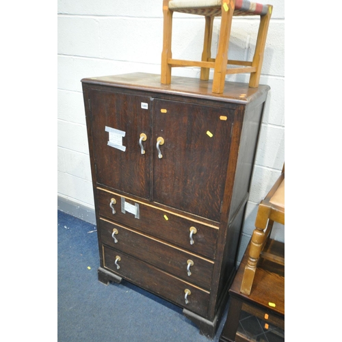 1491 - AN OAK TWO DOOR CABINET, with three drawers, width 77cm x depth 45cm x height 126cm, an oak tv stand... 