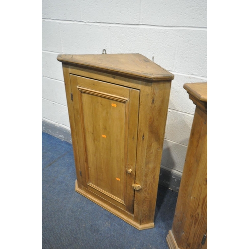 1503 - A LOW 19TH CENTURY PINE CORNER CUPBOARD, with a panelled door, width 100cm x depth 49cm x height 93c... 