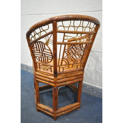 1506 - A BAMBOO AND CANE CHINESE CHIPPENDALE STYLE ARMCHAIR,  with an arched top rail, over a geometric pat... 