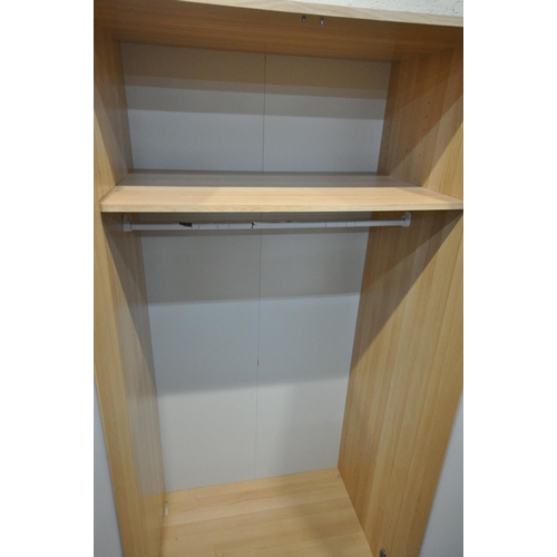 1511 - A MODERN BEECH BEDROOM SUITE, comprising two double door wardrobes, width 81cm x depth 51cm x height... 