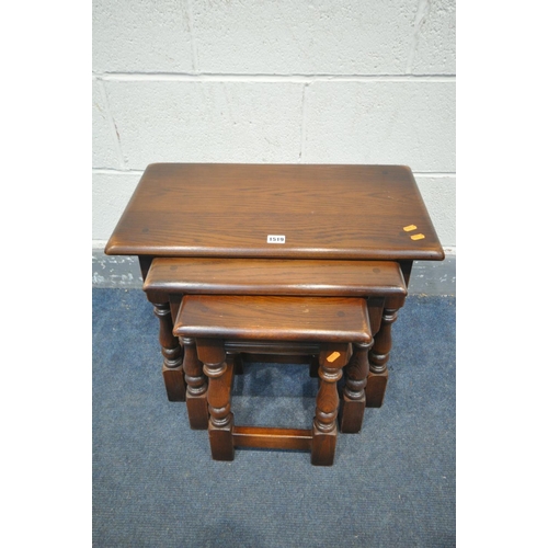 1519 - A SOLID OAK NEST OF THREE TABLES, largest table width 60cm x depth 33cm x height 46cm