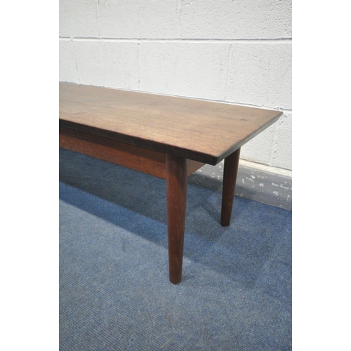 1536 - A 1960'S LONG RECTANGULAR DANISH STYLE SOLID MAHOGANY TOP COFFEE TABLE, on a teak base with tapered ... 