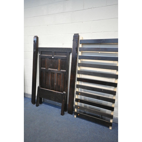 1545 - A GEORGIAN AND LATER OAK SINGLE BEDSTEAD, the headboard has various panelling, and later stained pin... 