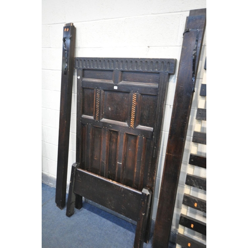 1545 - A GEORGIAN AND LATER OAK SINGLE BEDSTEAD, the headboard has various panelling, and later stained pin... 