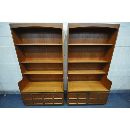 1558 - A PAIR OF NATHAN TEAK BOOKCASES, with double cupboard doors, width 102cm x depth 46cm x height 194cm... 