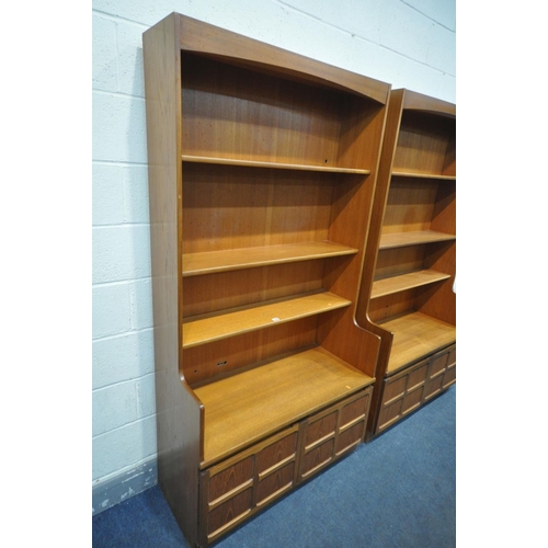 1558 - A PAIR OF NATHAN TEAK BOOKCASES, with double cupboard doors, width 102cm x depth 46cm x height 194cm... 