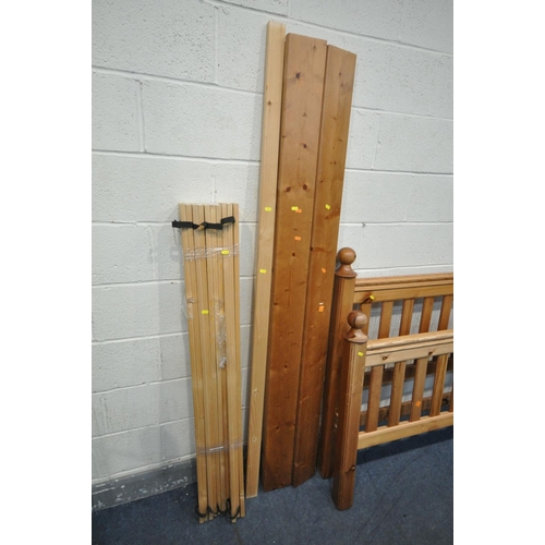 1570 - A 4FT6 PINE BEDSTEAD, with side rails and slats