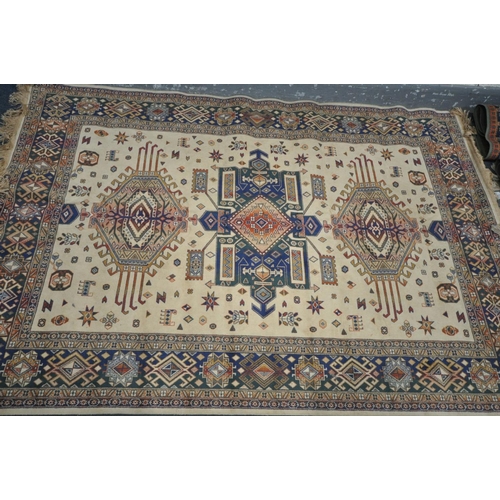 1576 - THREE VARIOUS VISCOSE CHIRAZ RUGS, comprising a beige ground rug, length 205cm x width 140cm, two gr... 