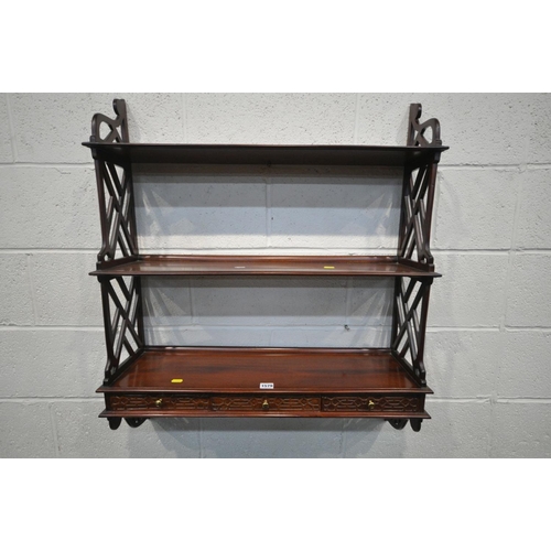 1579 - A REPRODUCTION CHIPPENDALE STYLE HANGING WALL SHELF, with three slim drawers, width 78cm x depth 22c... 