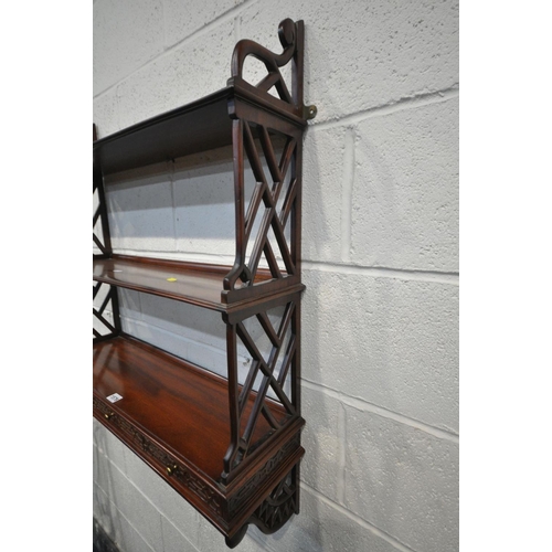 1579 - A REPRODUCTION CHIPPENDALE STYLE HANGING WALL SHELF, with three slim drawers, width 78cm x depth 22c... 