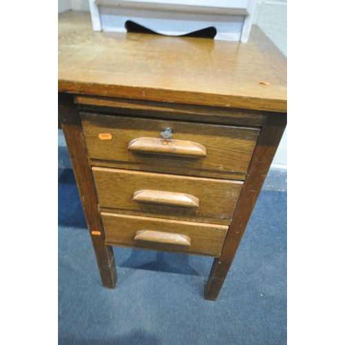 1588 - A JB FURNITURE OAK DESK, with a brushing slide three drawers, length 122cm x depth 69cm x height 77c... 