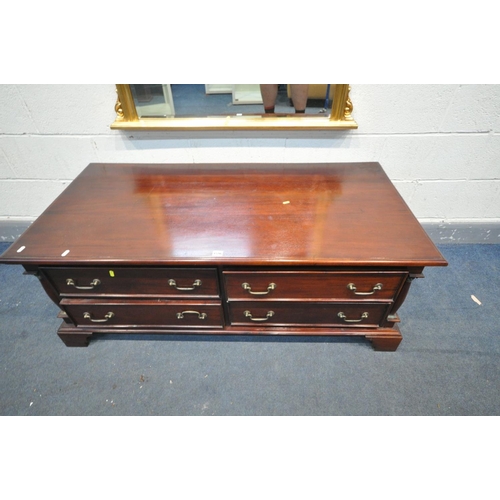 1596 - A LARGE MODERN MAHOGANY COFFEE TABLE, with four drawers, length 137cm x depth 68cm x height 52cm, an... 