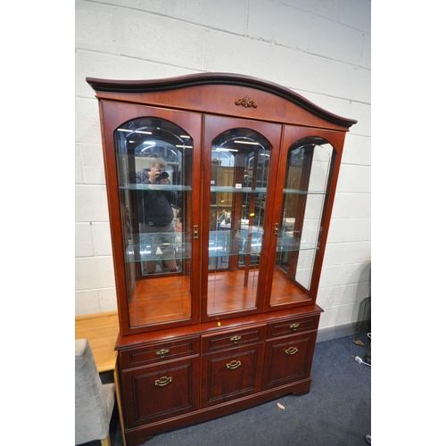 1597 - A MORRIS FURNITURE MAHOGANY GLAZED WALL UNIT, top with two doors, base with three doors and a single... 