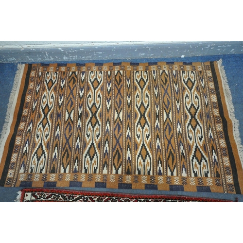 1605 - A RED GROUNG PERSIAN SHIRAZ RUG, length 136cm x depth 92cm, and another rug (good condition) (2)