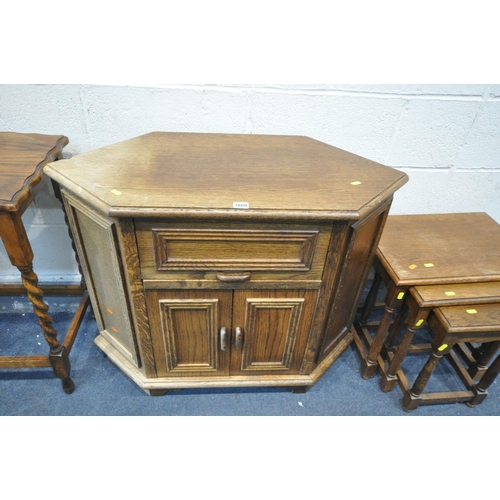 1609 - AN OAK CORNER TV UNIT WITH A FLIP OPEN DOOR AND TWO CUPBOARD DOORS, a 20th century oak barley twist ... 