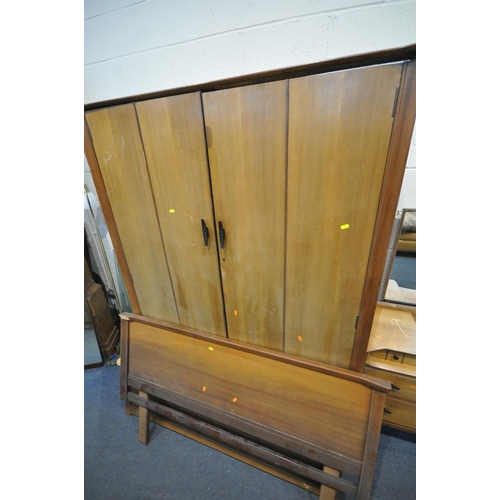 1610 - A LEBUS FURNITURE MID CENTURY TEAK FOUR PIECE BEDROOM SUITE, comprising a two door wardrobe, width 1... 