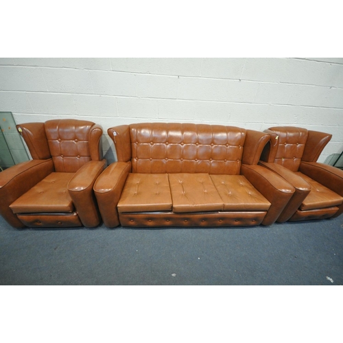 1612 - A BROWN LEATHERETTE BUTTONED THREE PIECE SUITE, comprising a three seater wing back sofa, length 182... 