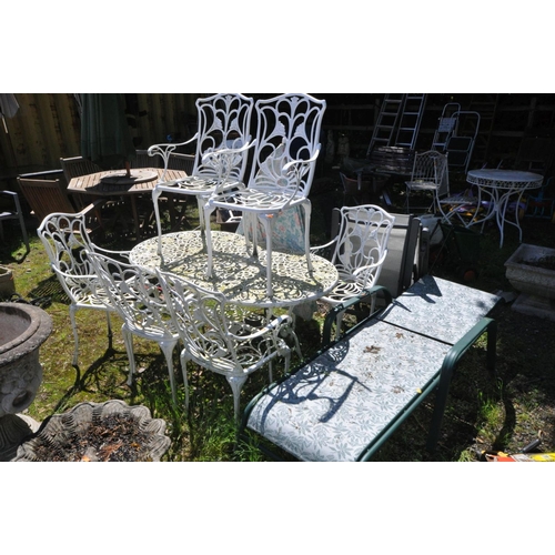 1203 - A WHITE PAINTED OVAL ALUMINIUM GARDEN TABLE with an under tier, length 140cm x width 82cm together w... 