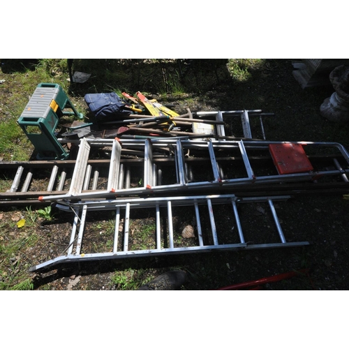 1204 - A SET OF DOUBLE EXTENSION 3.5M WOODEN FRAMED LADDERS, two aluminium step ladders, small set of step ... 