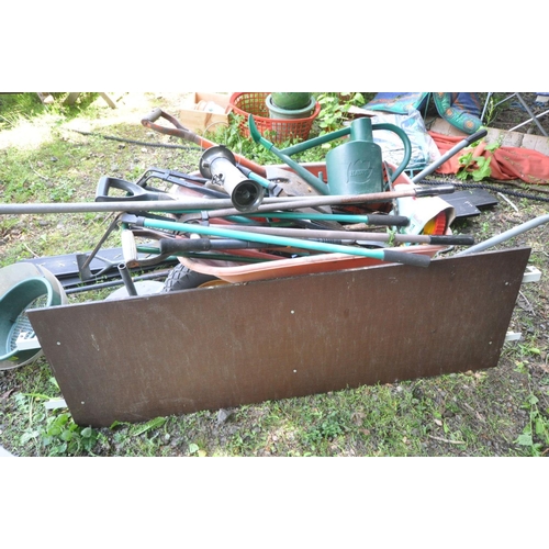 1209 - A QUANTITY OF VARIOUS GARDEN TOOLS include spades, shears, forks etc together with a metal and plast... 