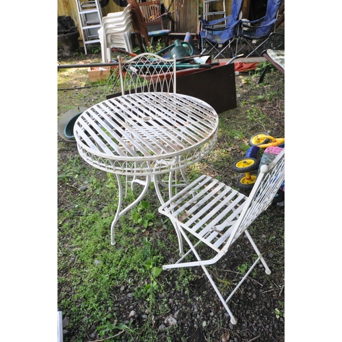 1210 - A WHITE METAL CIRCULAR GARDEN TABLE, diameter 74cm with two matching folding chairs (3)