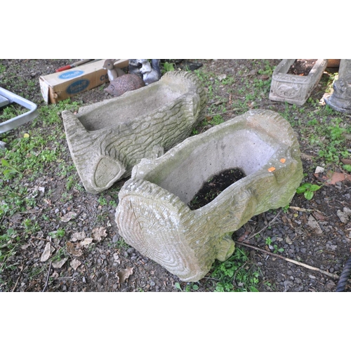 1212 - A PAIR OF COMPOSITE PLANTERS in the shape of logs, length 68cm x width 38cm