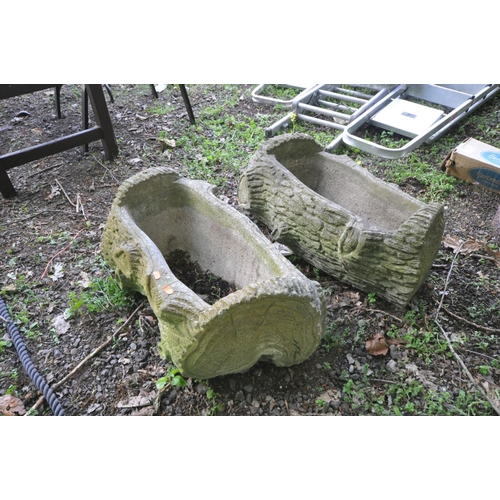 1212 - A PAIR OF COMPOSITE PLANTERS in the shape of logs, length 68cm x width 38cm