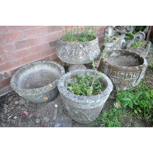 1222 - TWO COMPOSITE CIRCULAR PLANTERS and two circular urns, the largest, diameter 42cm x height 45cm