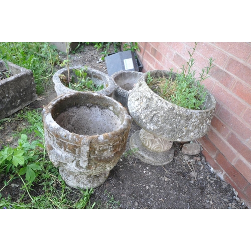 1222 - TWO COMPOSITE CIRCULAR PLANTERS and two circular urns, the largest, diameter 42cm x height 45cm