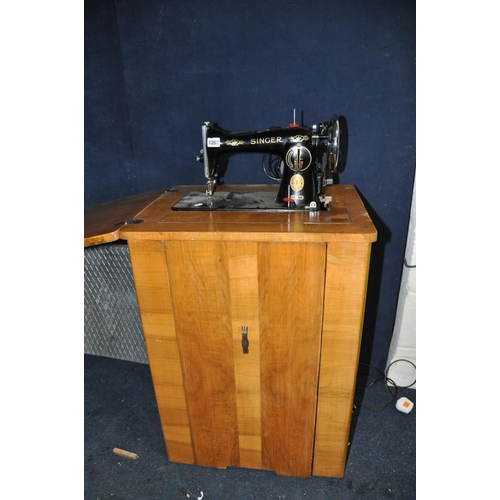 1263 - A SINGER 15K SEWING MACHINE with power cable and pedal (mounted on walnut cabinet with box of access... 