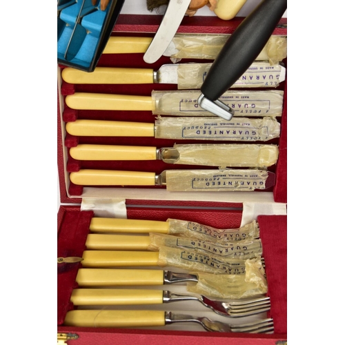 102 - A WOODEN CUTLERY STORAGE BOX AND OTHER CUTLERY, the wooden box with a hinged lid filled with assorte... 