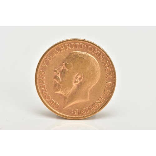 12 - AN EARLY 20TH CENTURY FULL GOLD SOVEREIGN COIN, depicting George V dated 1918, gross weight 8.0 gram... 
