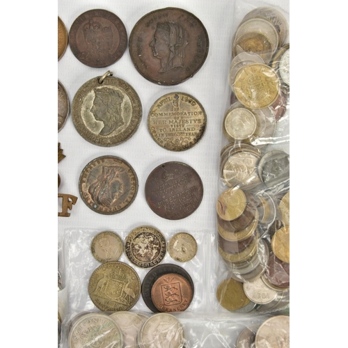 121 - A CARDBOARD TRAY OF UK AND WORLD COINS, to include medallions representing royalty and government wi... 