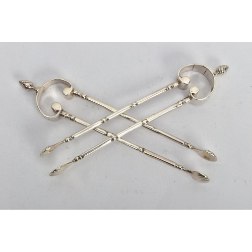 134 - A PAIR OF VICTORIAN SILVER SUGAR TONGS, with shell bowls, scrolling terminal and twisted finial, app... 