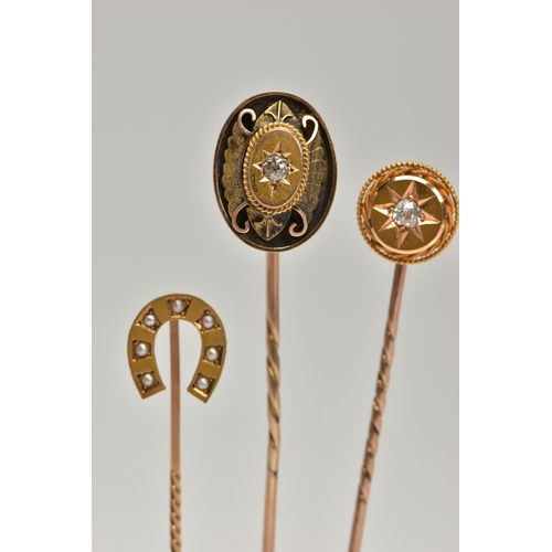 150 - THREE STICKPINS, to include a late Victorian 9ct gold split pearl horseshoe stickpin, hallmarked 9ct... 