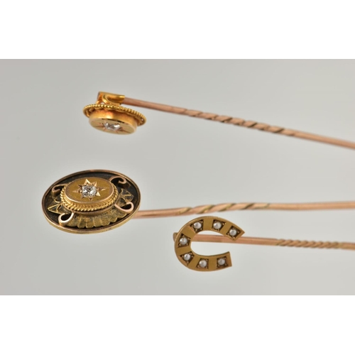 150 - THREE STICKPINS, to include a late Victorian 9ct gold split pearl horseshoe stickpin, hallmarked 9ct... 