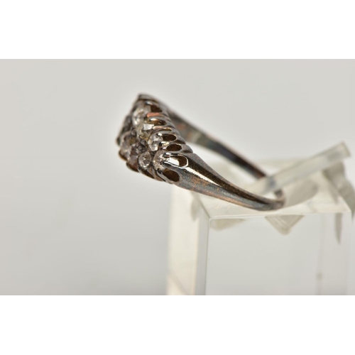 151 - AN OLD CUT DIAMOND DRESS RING, the graduated old cut diamond rows, with openwork gallery and tapered... 