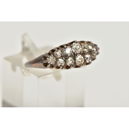 151 - AN OLD CUT DIAMOND DRESS RING, the graduated old cut diamond rows, with openwork gallery and tapered... 