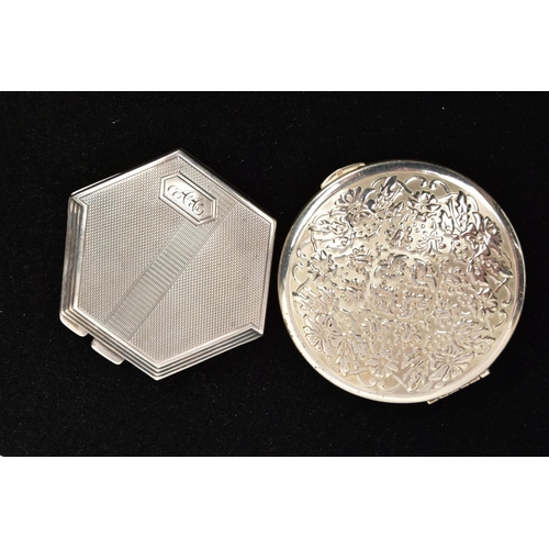 155 - TWO MID 20TH CENTURY SILVER COMPACTS, the first of hexagonal design, hinged fitting, engine turned d... 