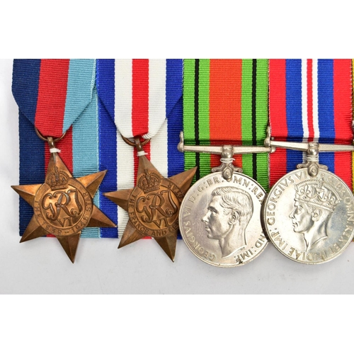 158 - A GROUP OF FIVE MEDALS ON A WEARING BAR AS FOLLOWS, 1939-45, France & Germany Stars, Defence & War m... 