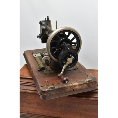 160A - A BRADBURY'S FAMILY V.S. MANUAL SEWING MACHINE, in working condition with wooden case