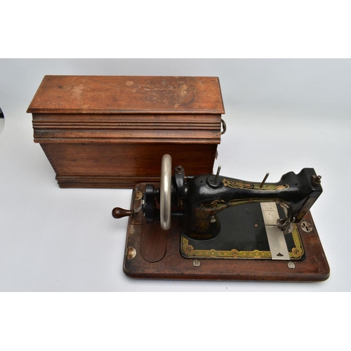 160A - A BRADBURY'S FAMILY V.S. MANUAL SEWING MACHINE, in working condition with wooden case