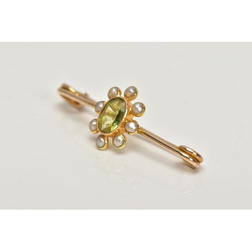 164 - A YELLOW METAL PERIDOT AND SPLIT PEARL BAR BROOCH, the oval collet set peridot, within a split pearl... 