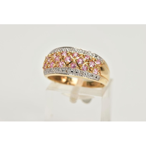 169 - A 14CT GOLD SYNTHETIC PINK SAPPHIRE AND DIAMOND DRESS RING, comprising synthetic pink sapphire rows ... 