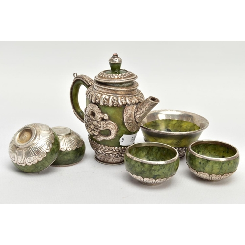 181 - A JADE AND WHITE METAL TEA SET, of decorative oriental design, to include a tea pot with lid and dra... 