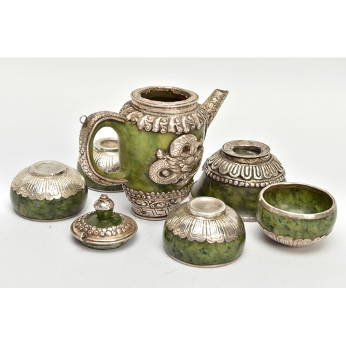 181 - A JADE AND WHITE METAL TEA SET, of decorative oriental design, to include a tea pot with lid and dra... 