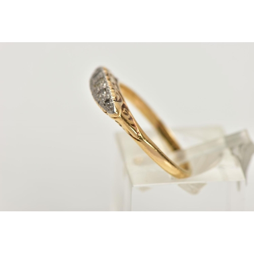 25 - AN EARLY 20TH CENTURY DIAMOND BOAT RING, centring on a single cut diamond, flanked with rose cut dia... 