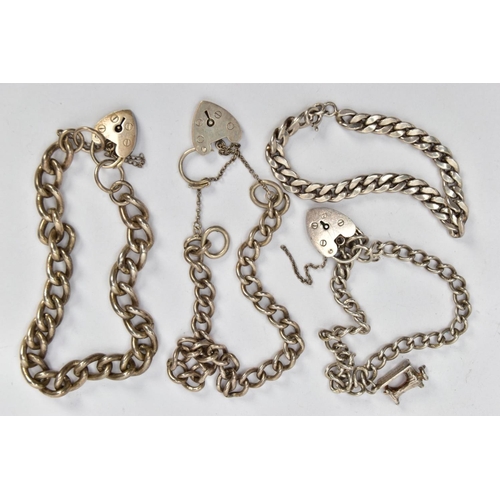 40 - FOUR BRACELETS, to include a silver charm bracelet each link stamped with a sterling mark, fitted wi... 