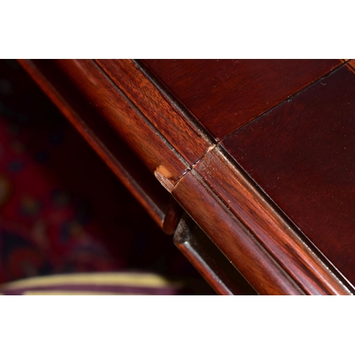 445A - A CHARLES BARR MAHOGANY AND BURR WOOD INLAID EXTENDING PEDESTAL DINING TABLE, with one additional le... 