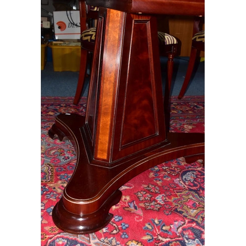 445A - A CHARLES BARR MAHOGANY AND BURR WOOD INLAID EXTENDING PEDESTAL DINING TABLE, with one additional le... 